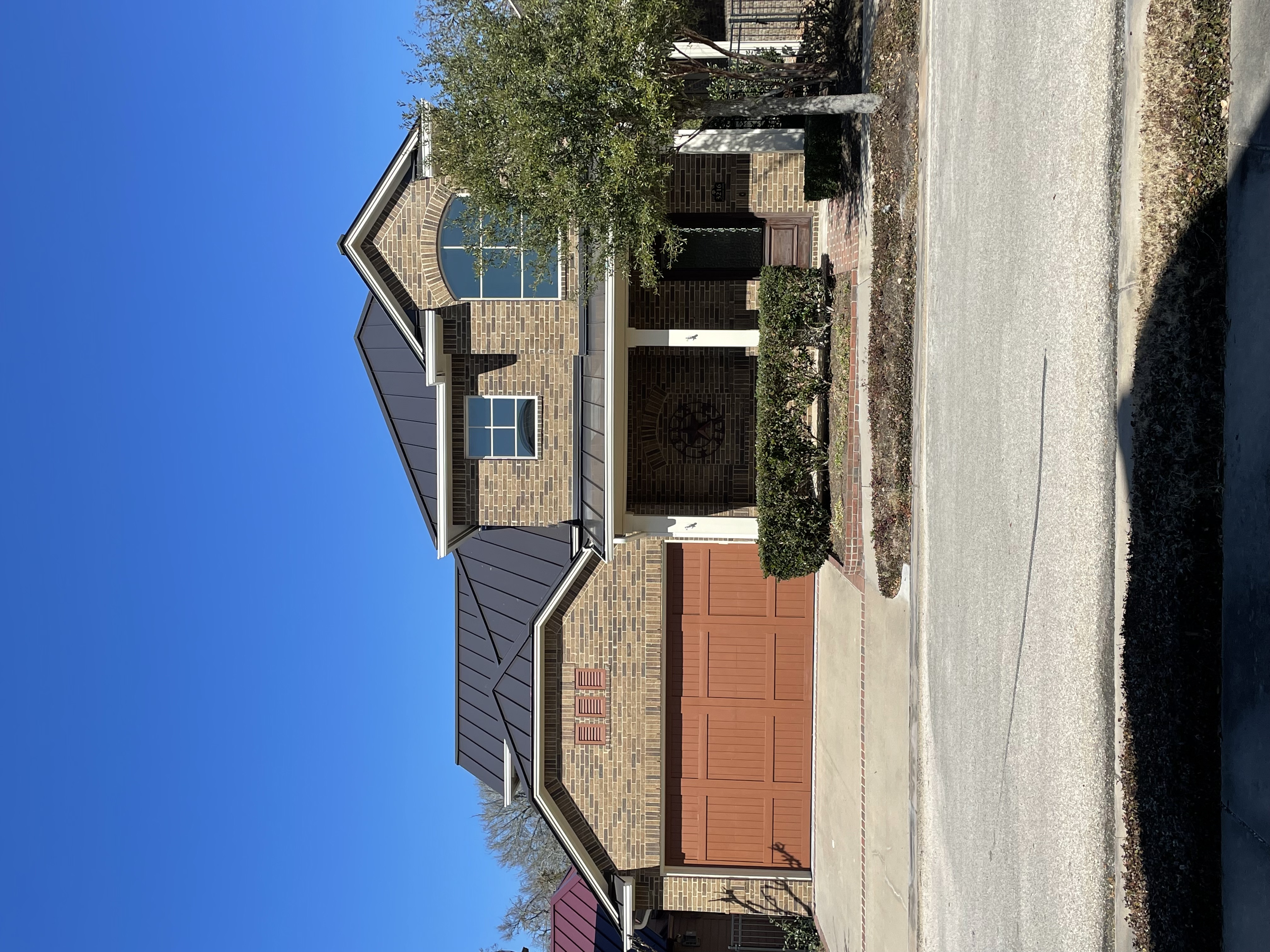 Metaluxe crew installing a roof in Collin County, TX